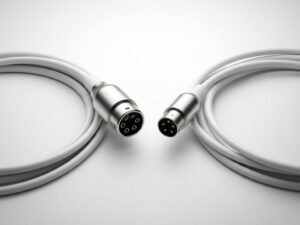 Type 2 en Type 1 EV-laadkabel connectoren op witte achtergrond, bovenaanzicht met symmetrische compositie