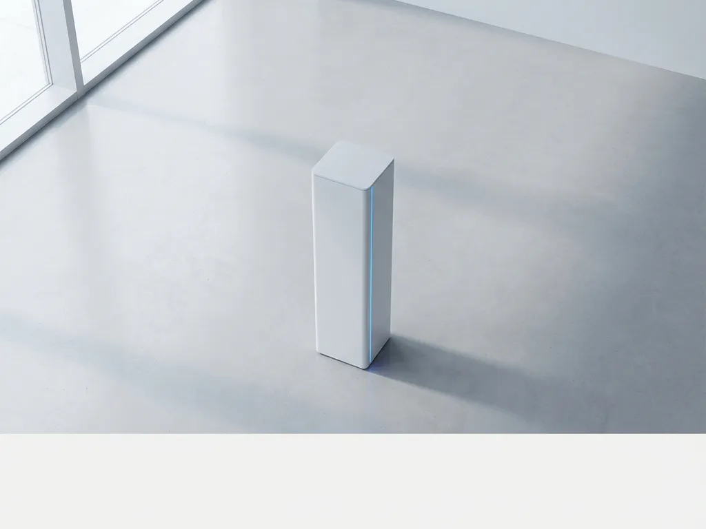 Witte slimme laadstation op betonnen vloer met LED-indicator en zachte schaduwen in minimalistische setting